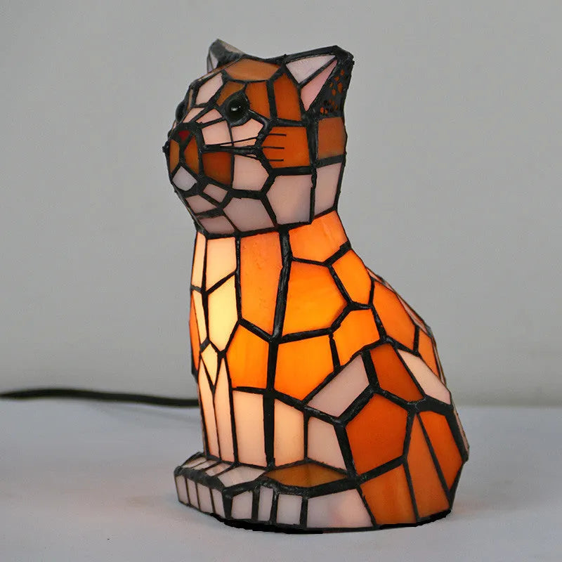 Animal-themed table lamp with Tiffany stained glass shade, 12.5cm wide and 17.8cm high, E12/E14 holder and 5W bulb