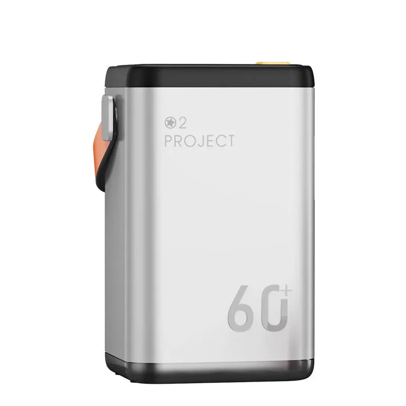 Large grey outdoor power bank with 60000mAh capacity showing multiple USB ports for device charging