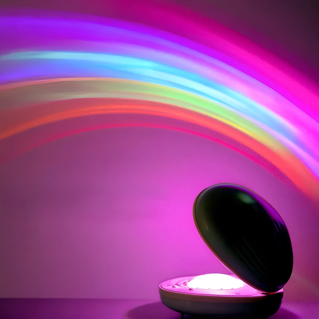 White egg-shaped LED table lamp, 14 x 10 x 6cm, projecting a rainbow onto a wall, USB rechargeable night light