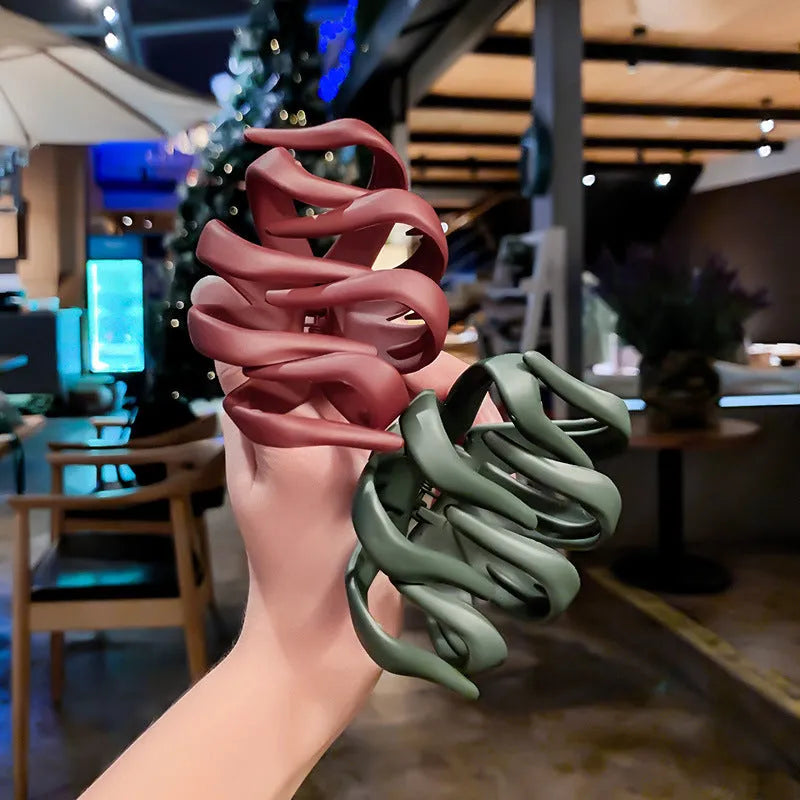 Children's hair clips in small and large sizes with green, dark blue, wine red, black, dark pink, and blue grey colour options