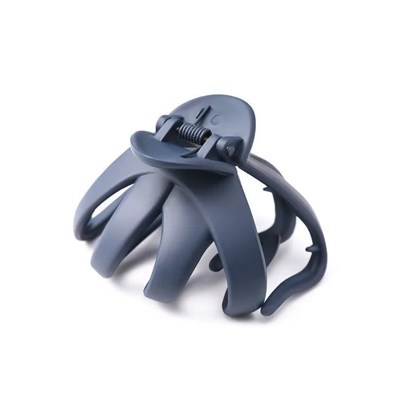 Children's hair clips in small and large sizes with green, dark blue, wine red, black, dark pink, and blue grey colour options