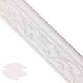 Modern grid pattern self-adhesive skirting line trim in gold, shown protecting a living room wall.