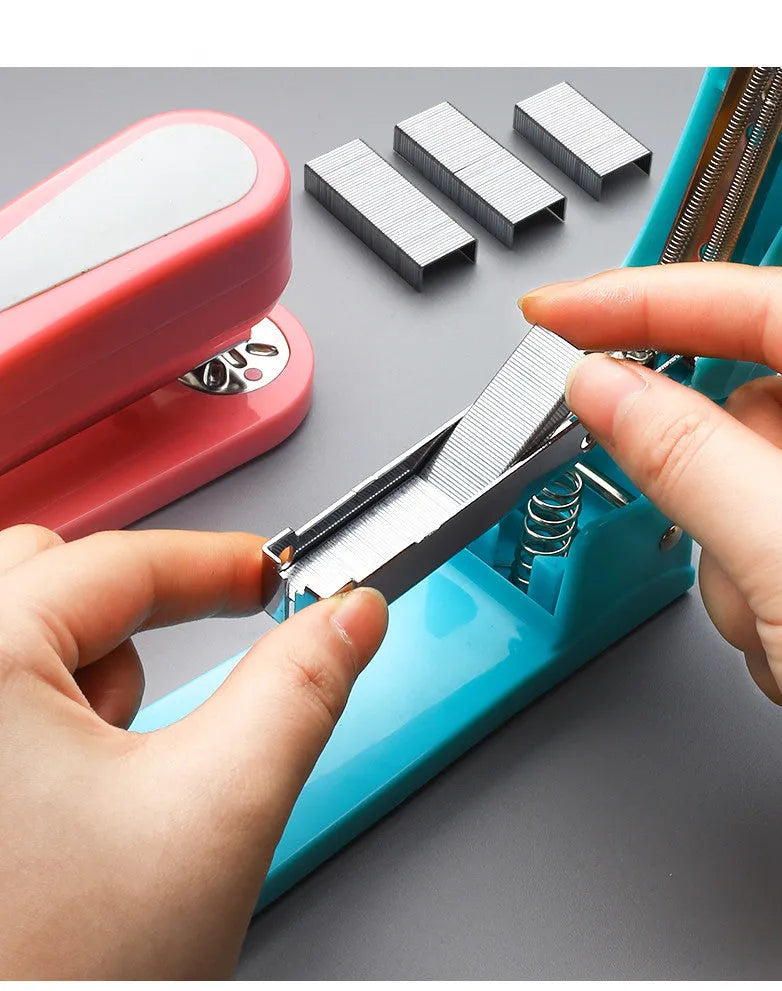 A rotatable stapler in blue showing its 360-degree turning head and metal nail outlet.
