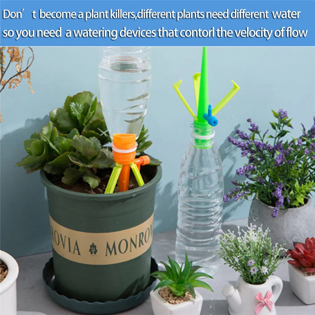 Set of 10 plastic plant watering spikes, 5 green and 5 orange, each 16.5cm x 3cm for garden pots.
