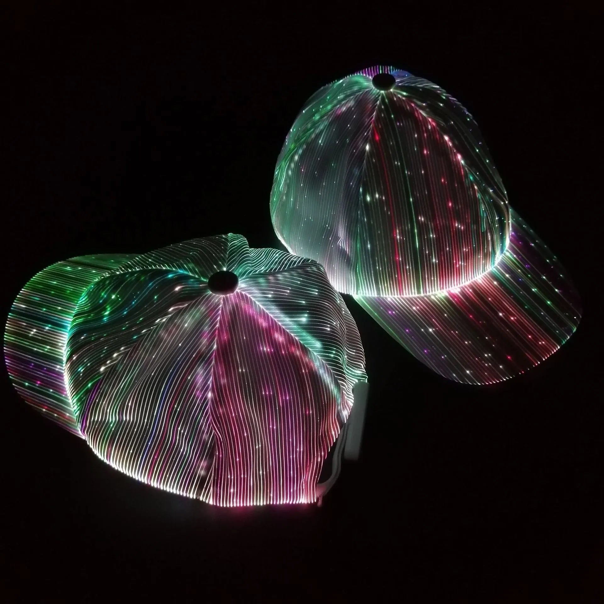 White fibre optic luminous baseball cap with LED glow on dark background