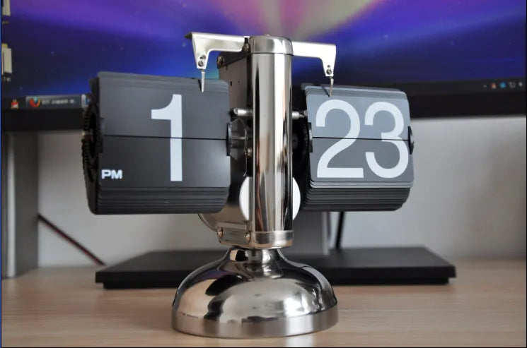 Small scale retro flip digital clock black on one foot white on the other 21x8x16 cm