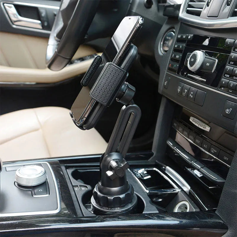 Black ABS plastic car phone holder with 360-degree rotation and adjustable height on a car air vent.