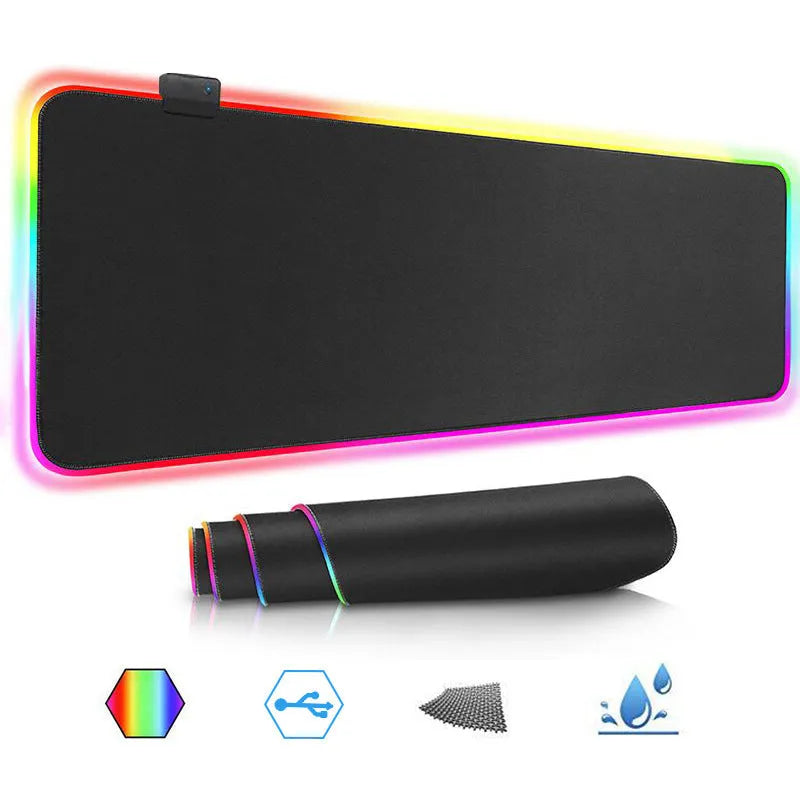 Luminous RGB mouse pad with LED lighting in 300x800mm size on a desk