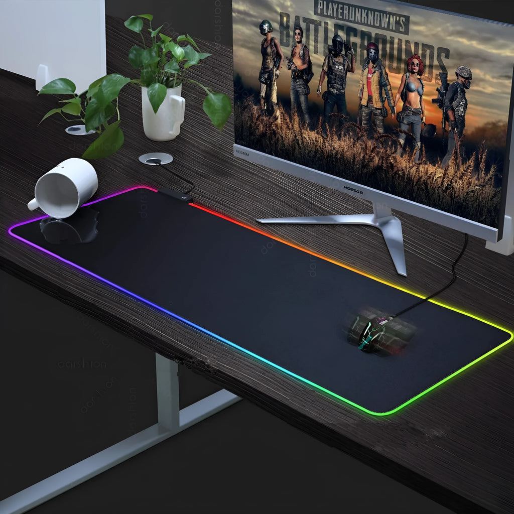 Luminous RGB mouse pad with LED lighting in 300x800mm size on a desk