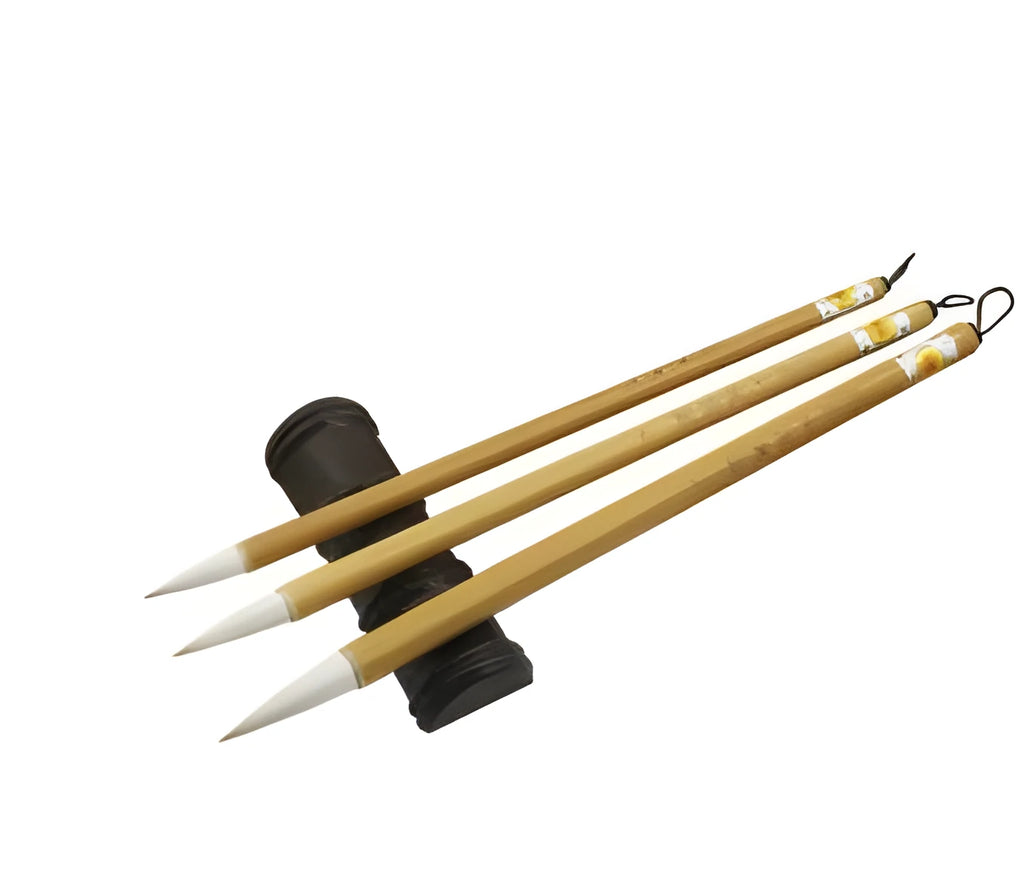 Three Chinese calligraphy brushes with bamboo handles and woolen hair bristles in different sizes
