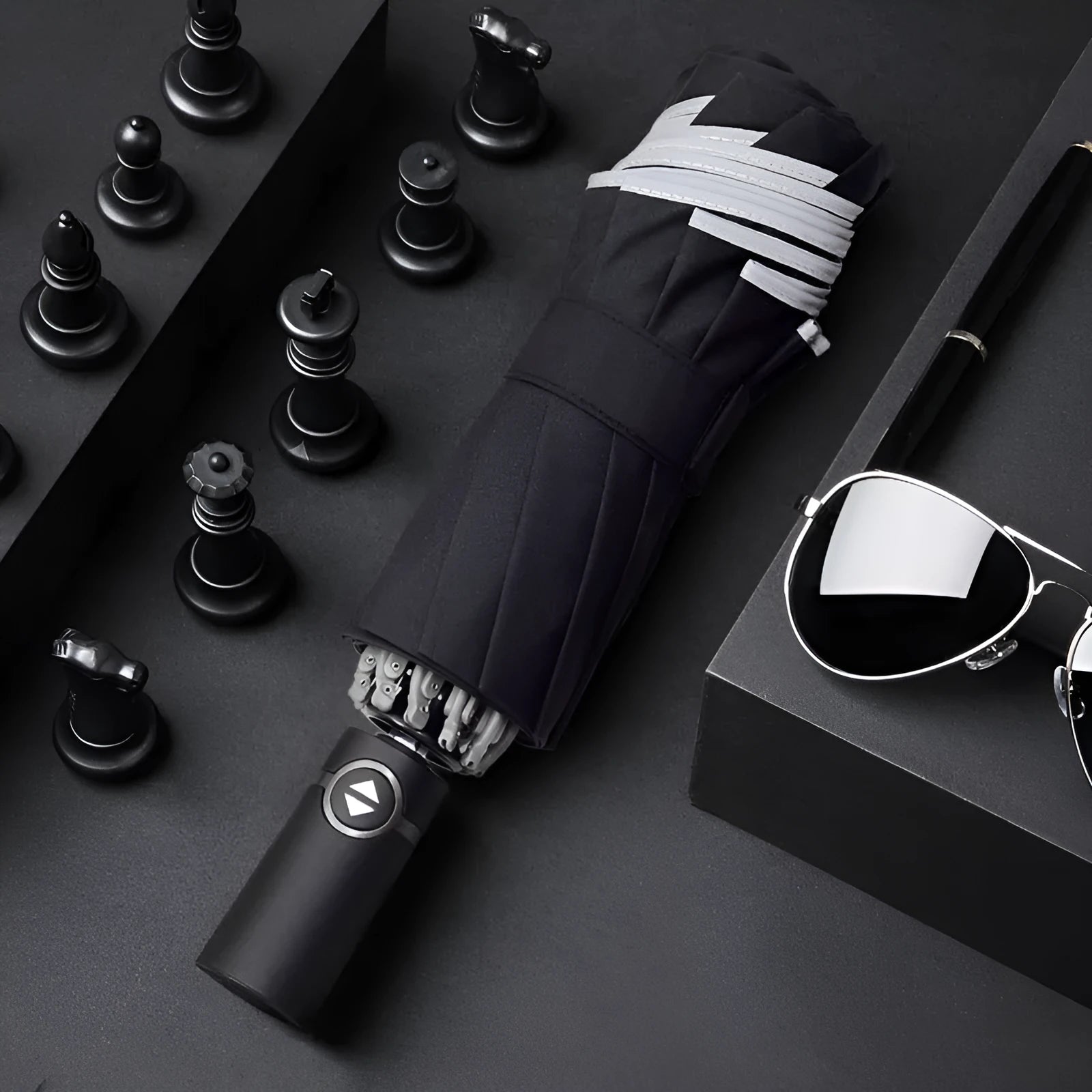 Automatic reverse umbrella showing three-fold design and plastic non-slip handle