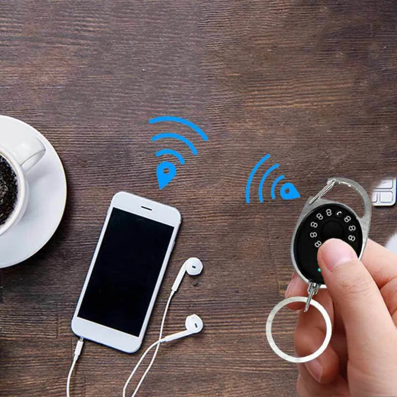 Black Bluetooth anti-lost tracker with keychain, compatible with iPhone, two-way alarm and selfie remote, 35x55x90mm