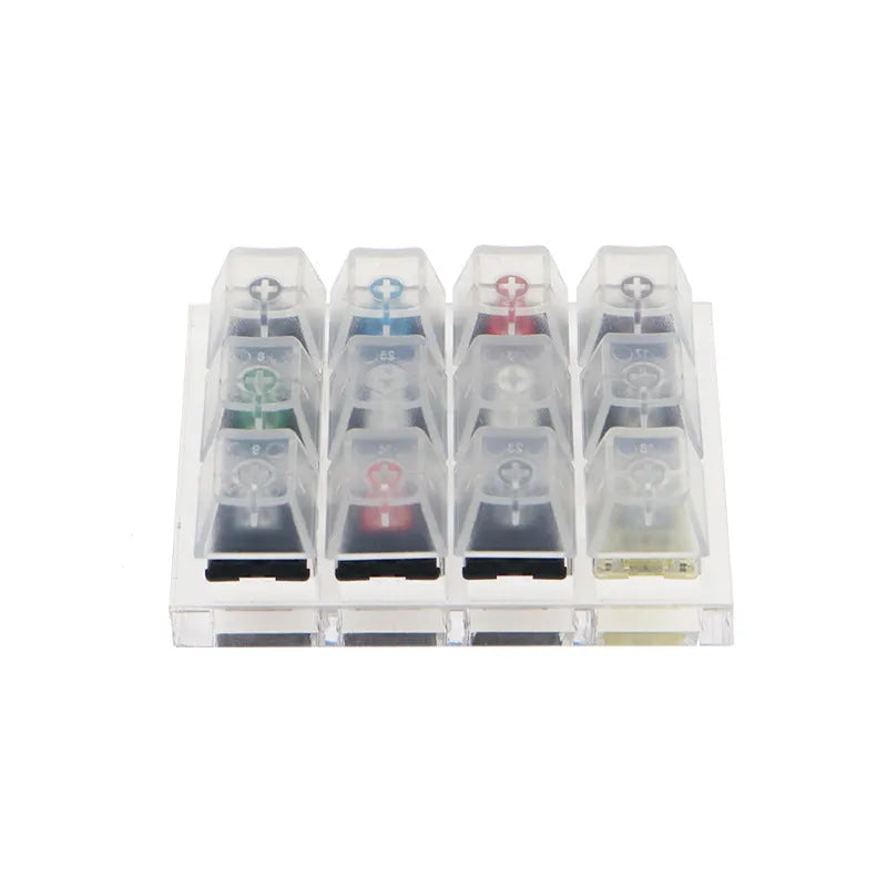 Cherry twelve-axis switch tester with white housing showing black green black tea and milk green switches