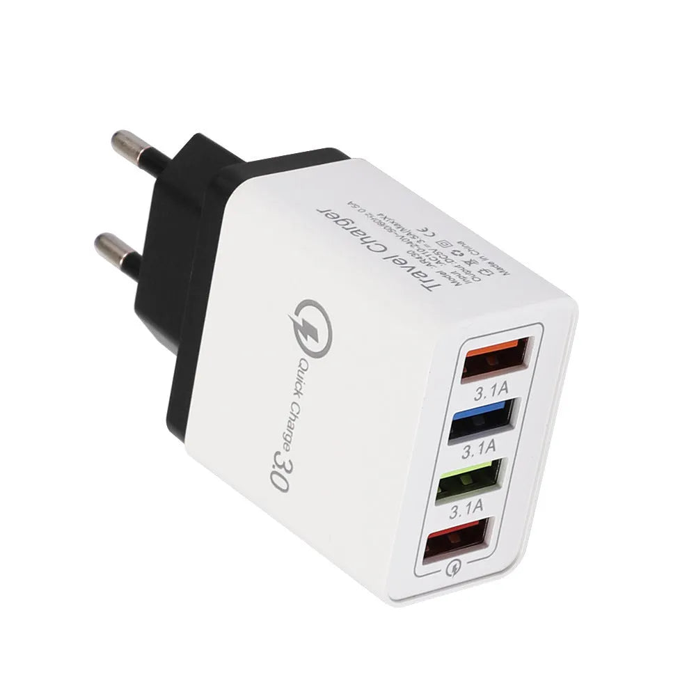 Luminous 4-port USB mobile phone charger in dark blue with EU plug, showing glowing indicator lights.