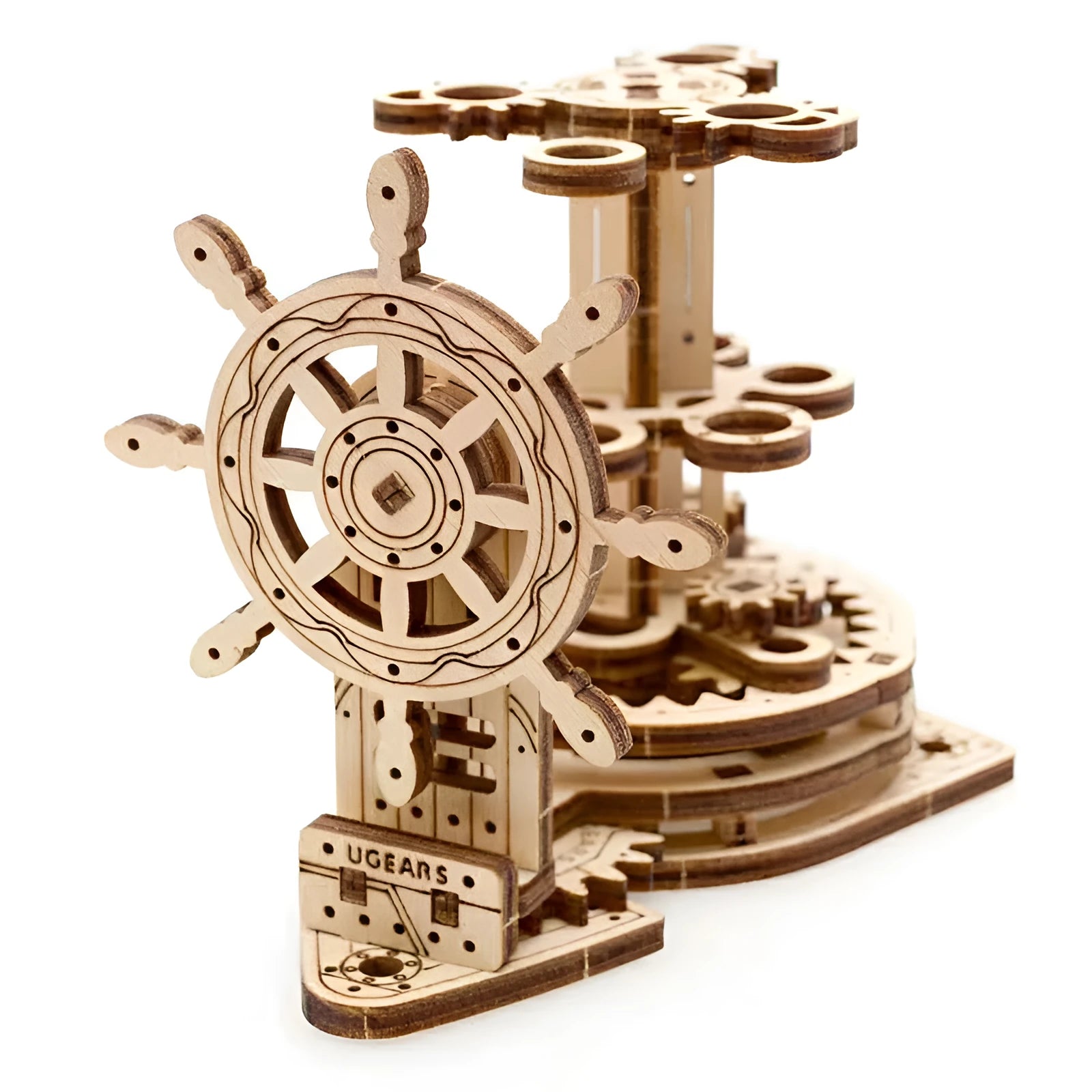 Ukrainian wooden rotating pen holder model with visible gears on a desk.