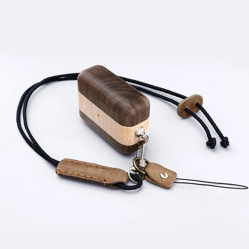 Solid wood hard shell earphone sleeve for Bluetooth wireless earphones in natural wood finish