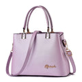 Ladies PU leather handbag with zip closure, horizontal square shape, car suture detail, and single handle