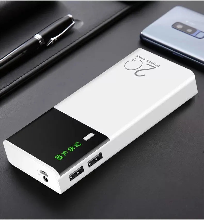 Black 20000mAh power bank measuring 135mm by 60mm with included charging cable
