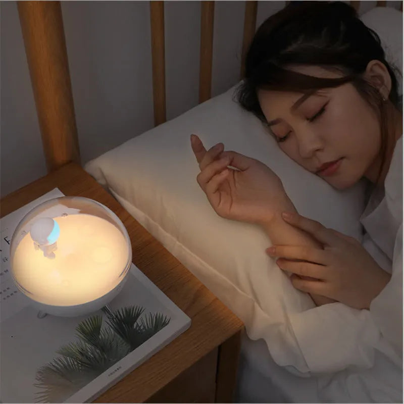 USB-powered LED night light with plastic shade in white or blue colour options