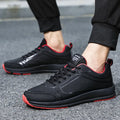Men's casual synthetic leather colour-block lace-up shoes with rubber sole in 888 black and white on a plain background