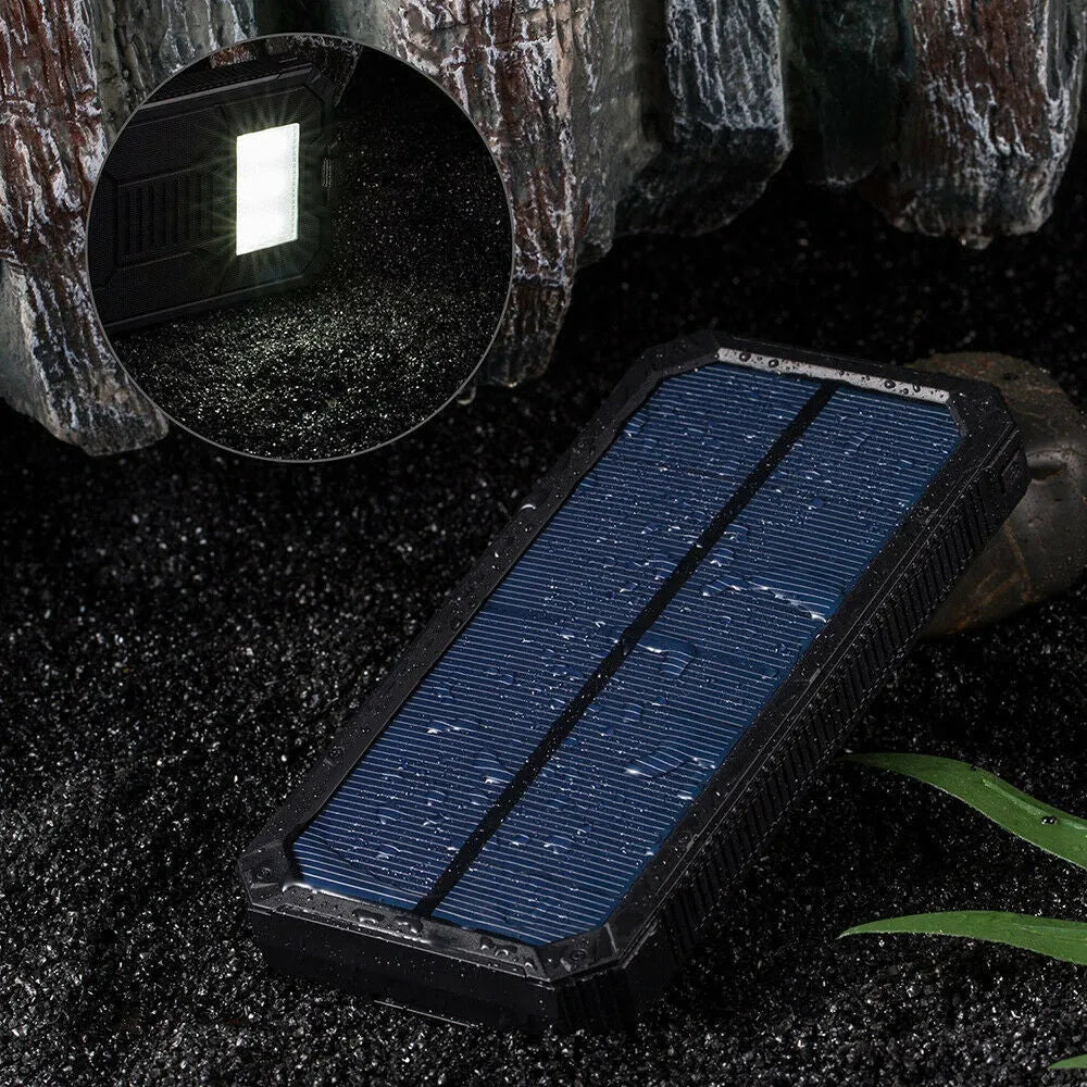 Orange solar power bank showing multiple USB ports and displaying 20000 mAh capacity
