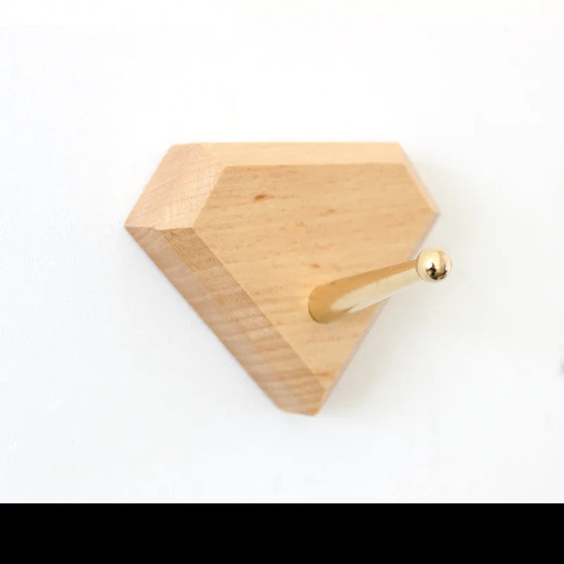 Beech wood and brass adhesive hook with modern simple styling and 10kg load capacity