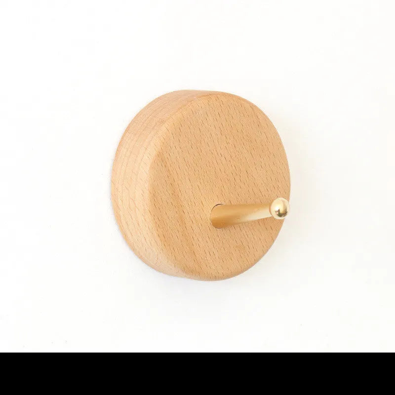 Beech wood and brass adhesive hook with modern simple styling and 10kg load capacity