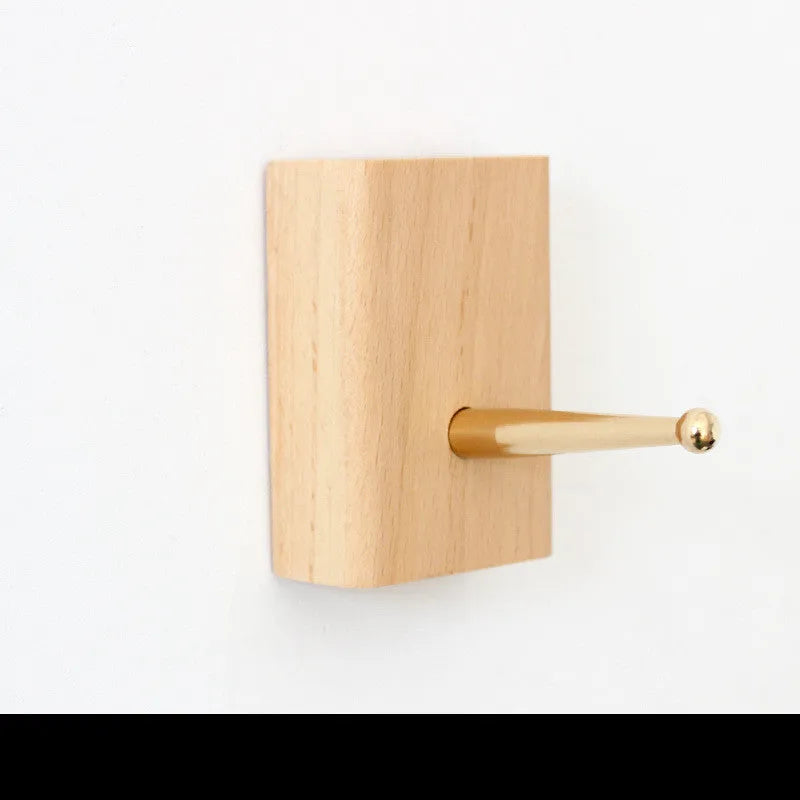 Beech wood and brass adhesive hook with modern simple styling and 10kg load capacity