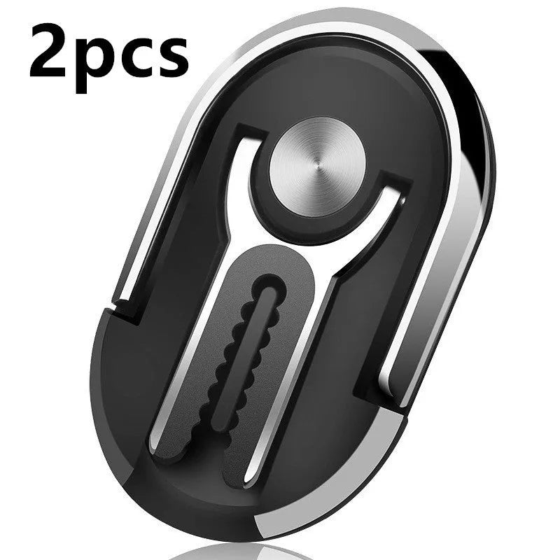 Universal car mobile phone bracket in black mounted on a car dashboard.