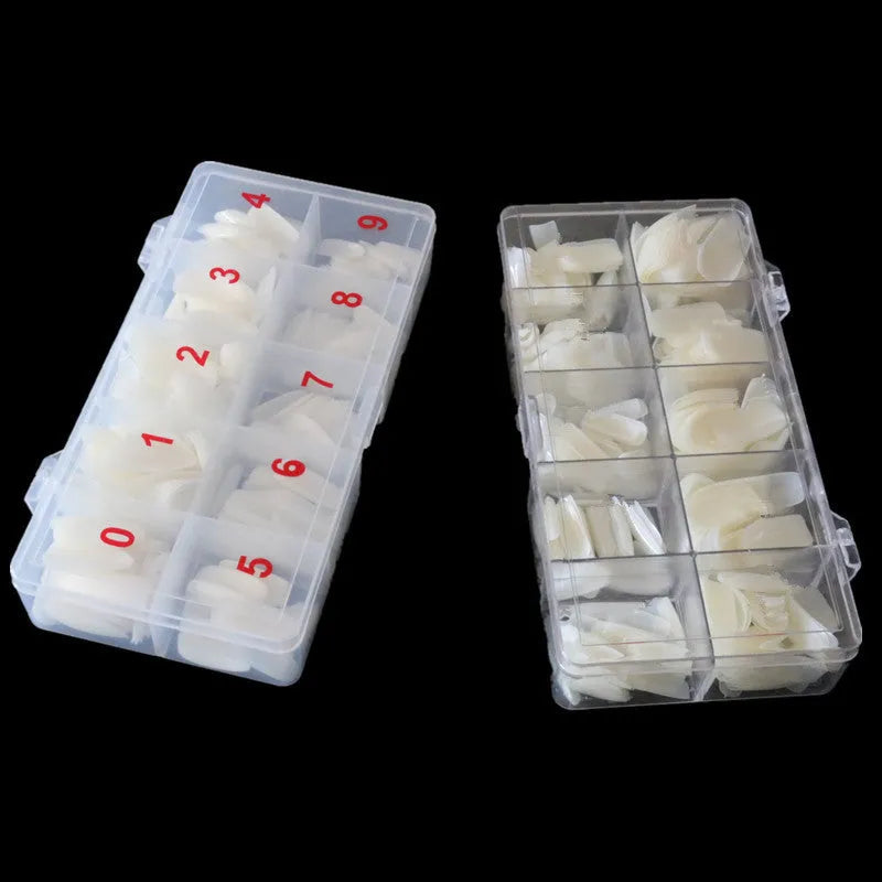 Box of 500 nail armour pieces in transparent, natural colour, and white finishes for home or salon use.
