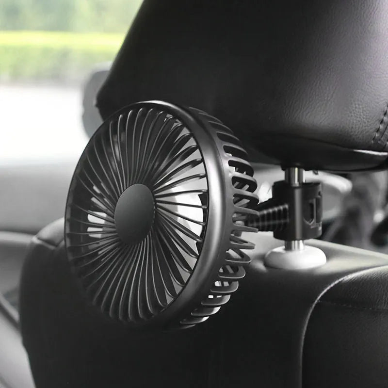 Mini car fan with black ABS plastic housing and USB cable in suction cup mounting style