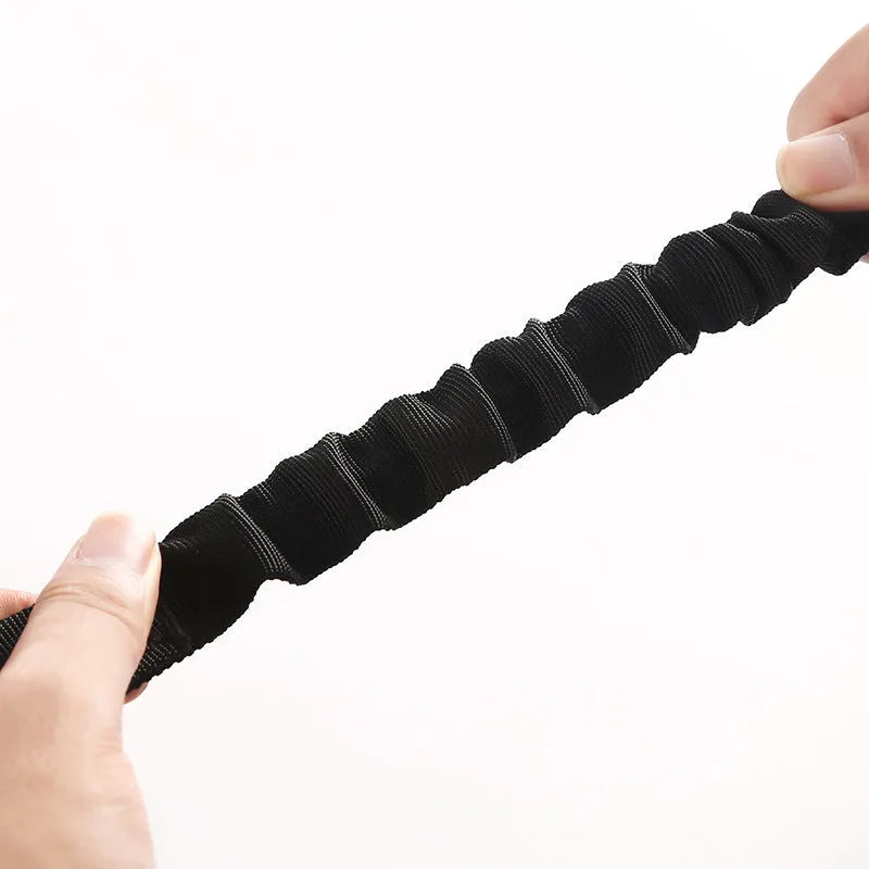 Black nylon pet vehicle retractable safety rope with metal buckle on car seat
