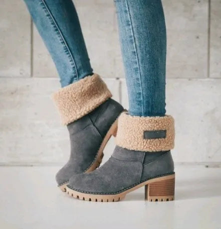 Women's mid-calf suede snow boot with thick heel on a waterproof platform.