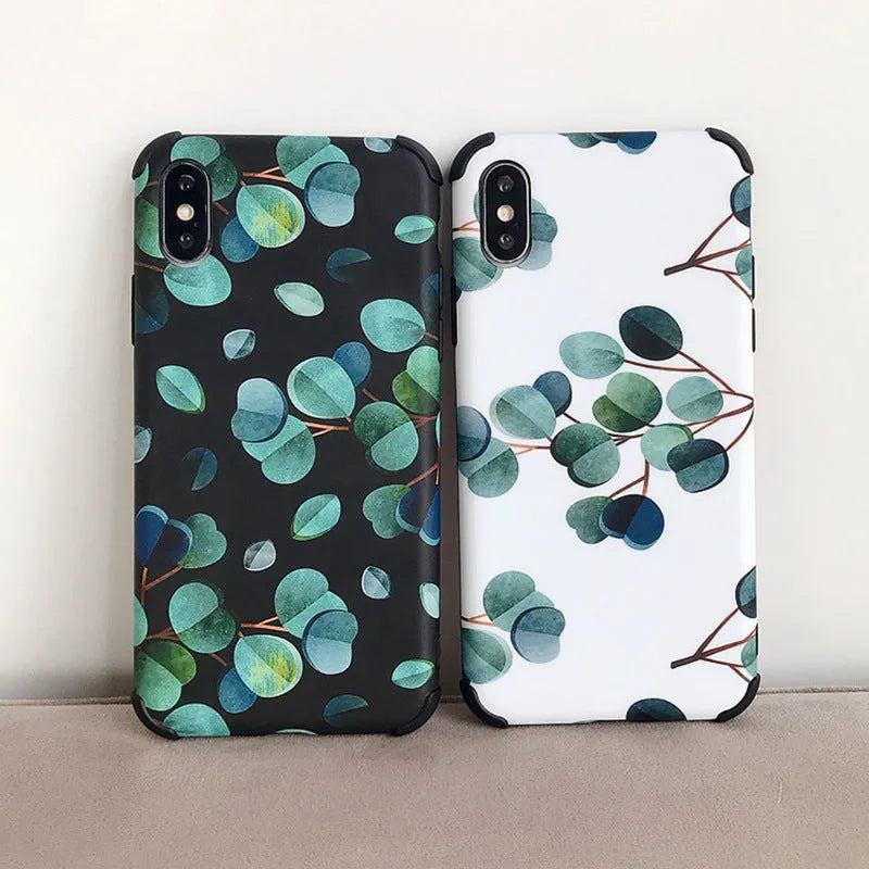 Black silicone iPhone case with raised leaf pattern texture on back