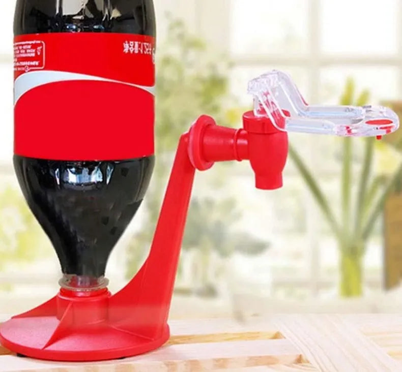 Red plastic Magic Tap soda dispenser for 2-litre bottles, 15 cm high, 10 cm diameter, with push-in tap.