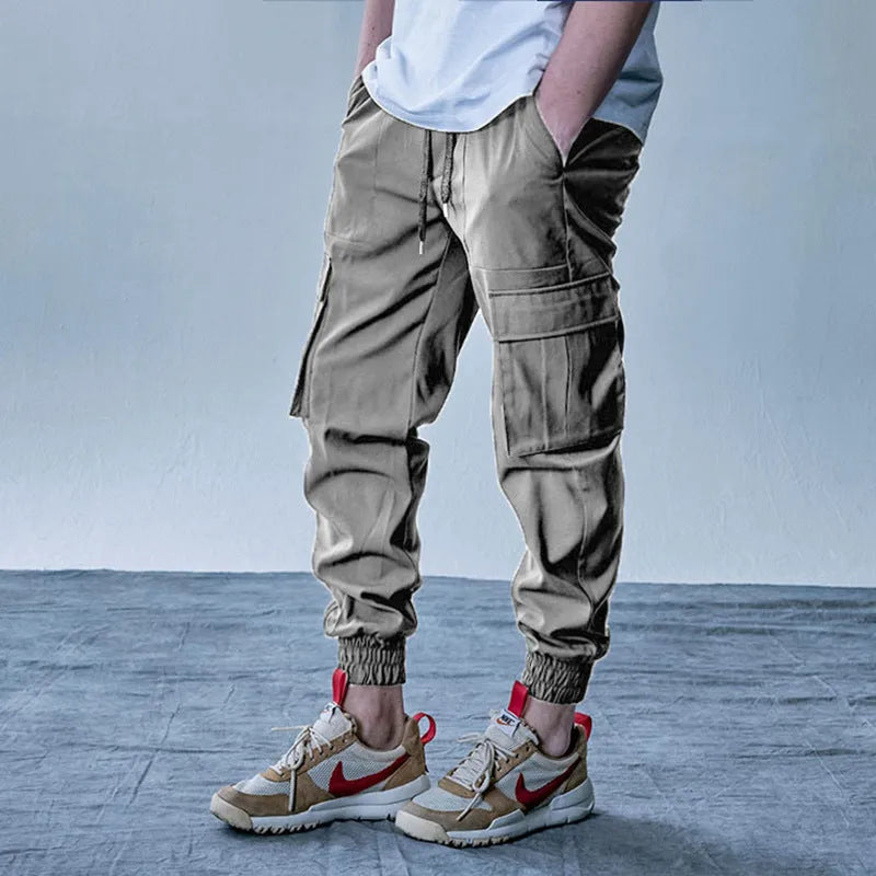Men's loose sports trousers in plus velvet knitted polyester, army green, with double waist and tether closure.