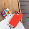 Solid-colour silicone iPhone case shown in multiple colour options