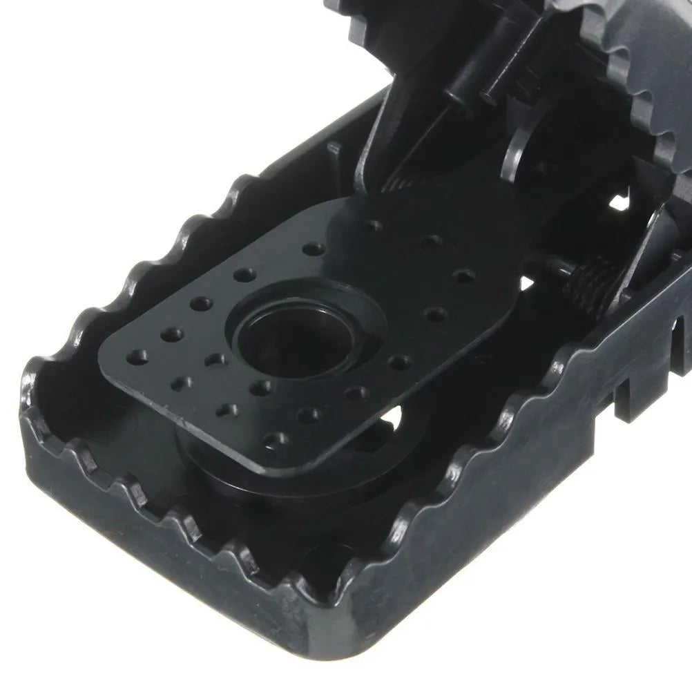 Pack of six black plastic mousetraps showing snapping mechanism and measurements