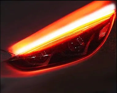 Flexible silicone car LED light strip for daytime running lights and turn signals.
