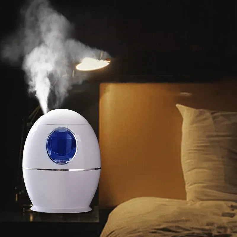 White columnar household air disinfection humidifier with USB cable on a table.