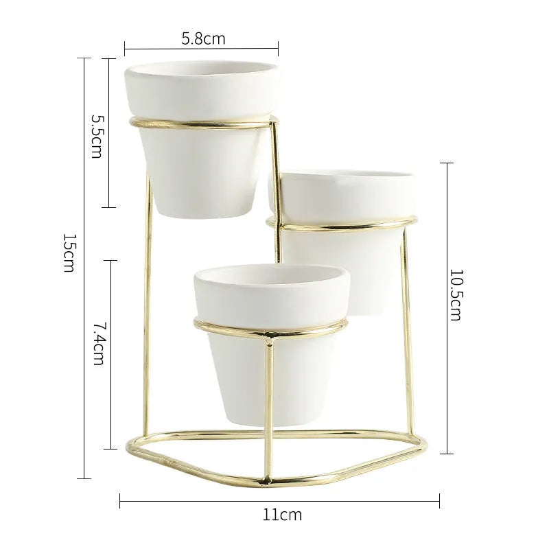 Grey pottery flower pot set with electroplated finish, shown in black grey, black white, gold grey, and gold white colour options