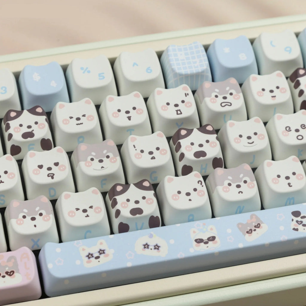 Colourful puppy character PBT key cap set for mechanical keyboards with 26 alphabetical characters.