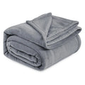 Light grey polyester coral flannel blanket for office naps and air conditioning, shown in a solid colour