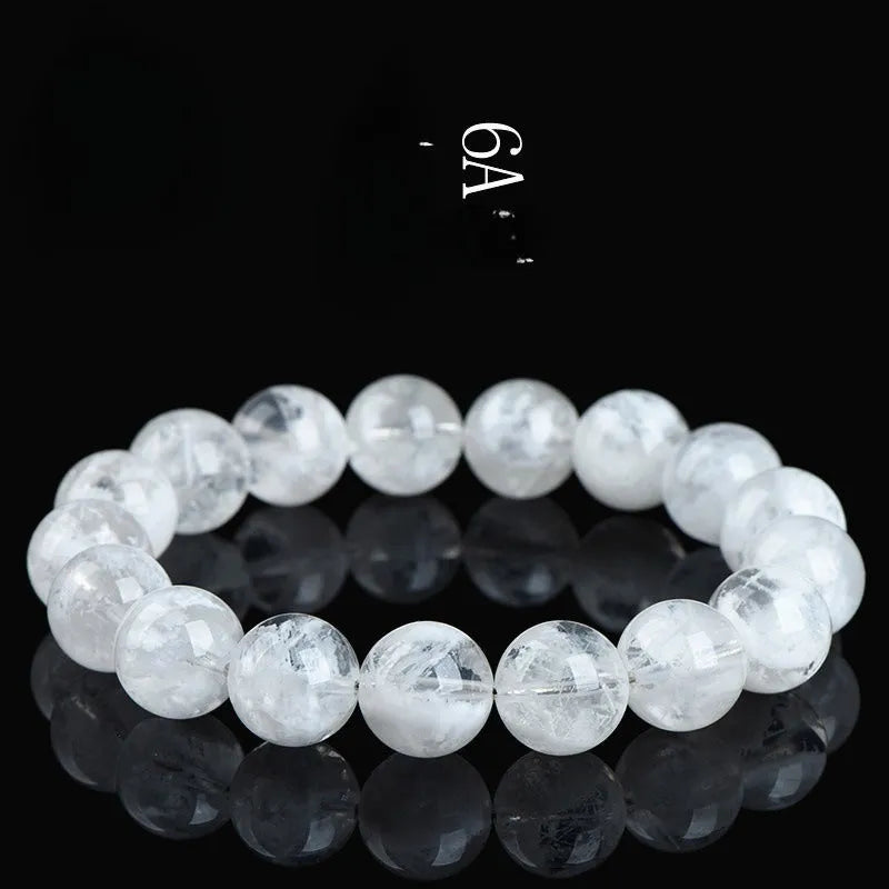 Women's crystal beaded bracelet with blizzard snowflake round beads and Ruyi Xiangyun design.