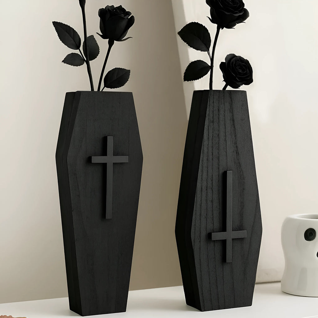 Black wooden cross-shaped wall shelf with dimensions 27cm by 9cm for displaying small decorative items.