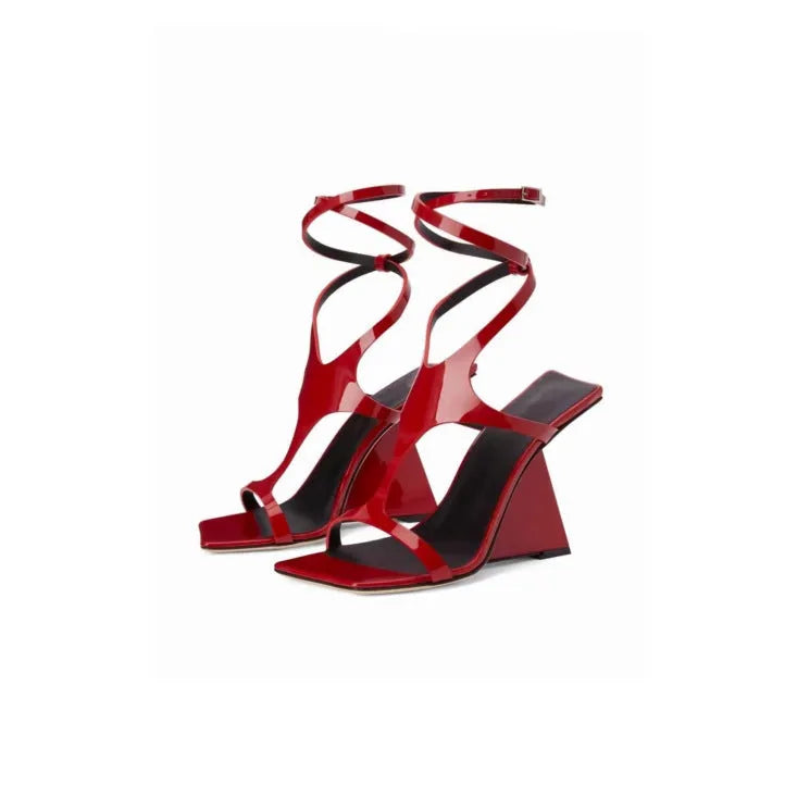 Women's black high heel sandals with 9.5cm heel, square toe, and button fastening.