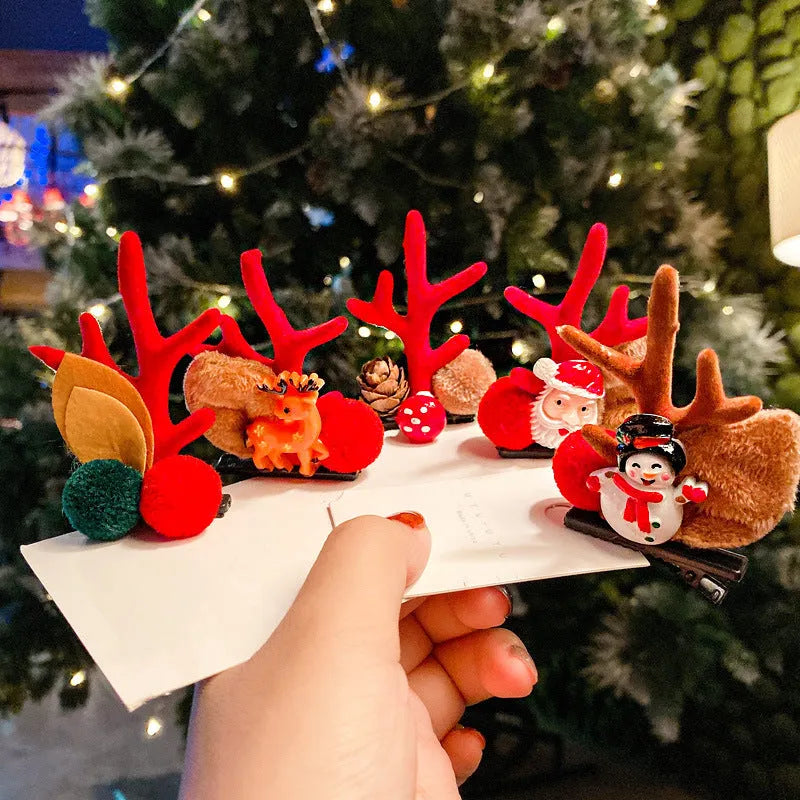 Set of plastic resin Christmas hair clips for kids with antler and snowman designs