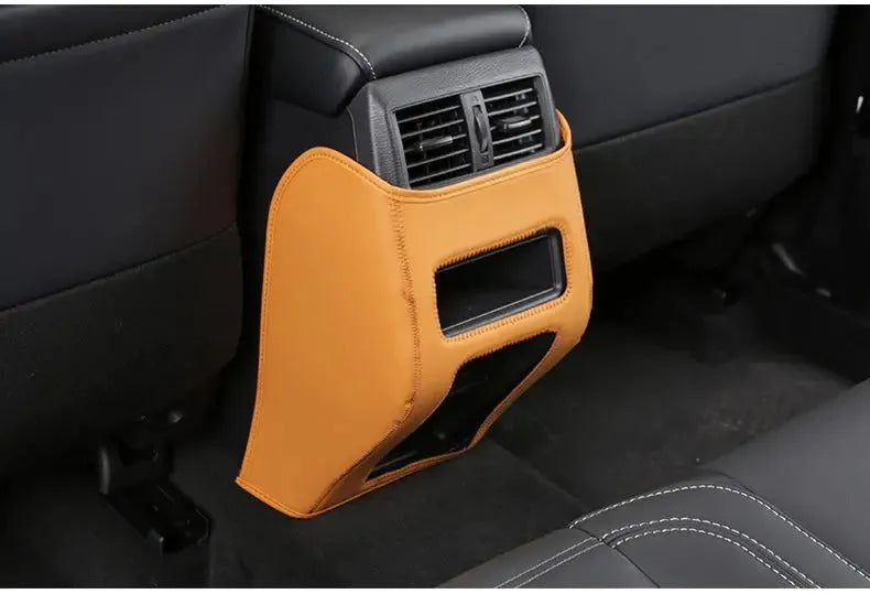Three leather anti-kick pads for Mitsubishi Outlander interior protection