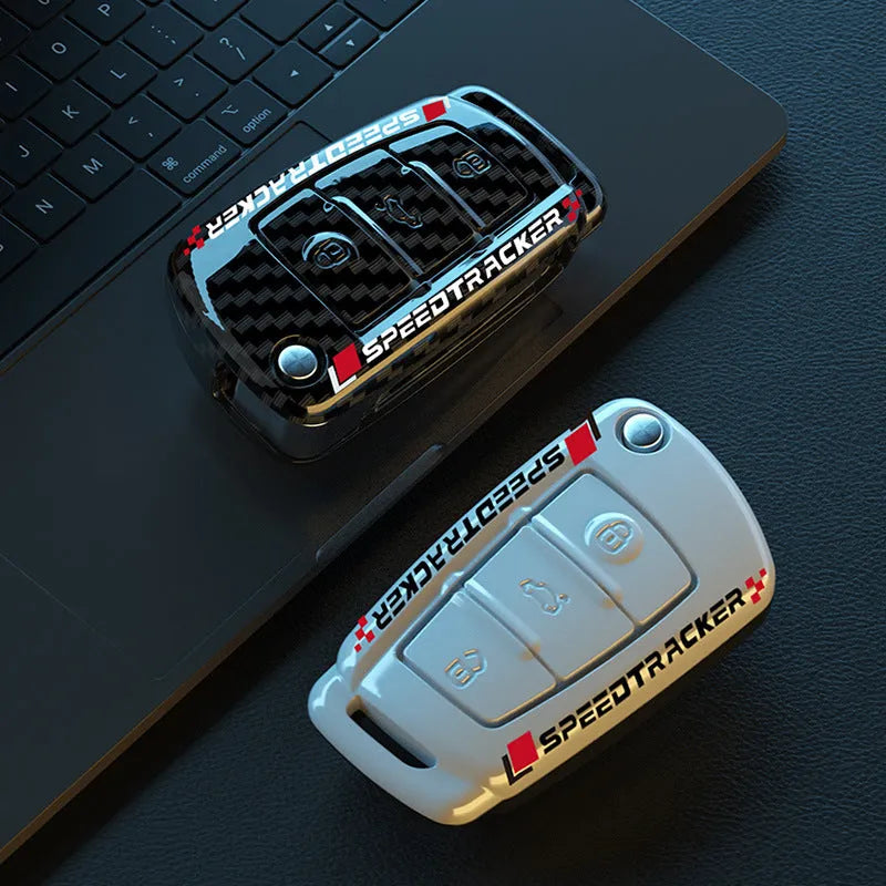 Carbon fibre style car key cover with mirror elements in carbon and white colours