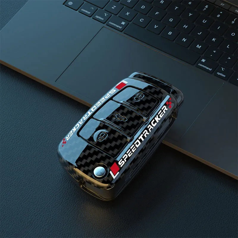 Carbon fibre style car key cover with mirror elements in carbon and white colours